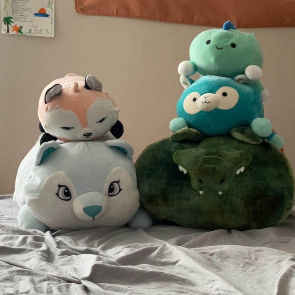 5 laying squishmallows